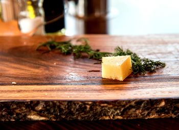 Close-up of cheese on cutting board