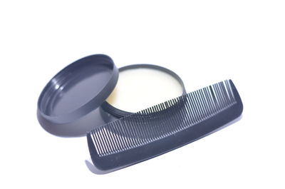 High angle view of black coffee against white background