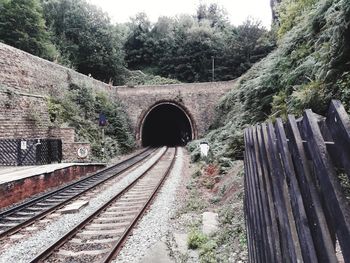 Railroad tracks in tunnel