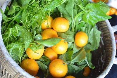 High angle view of oranges in basket