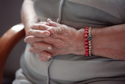 Close-up of couple holding hands