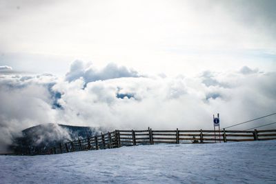 Scenic view of snow covered mountains