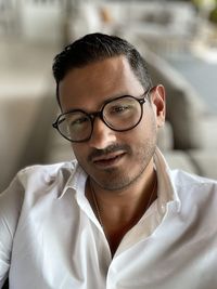 Portrait of young man wearing eyeglasses