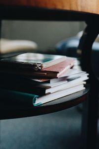 Close-up of stacked books on table