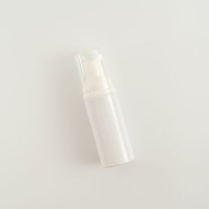 High angle view of bottle against white background