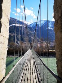 View of suspension bridge against sky