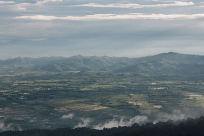 Aerial view of landscape and mountains against sky