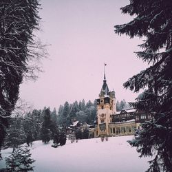 Buildings against sky during winter