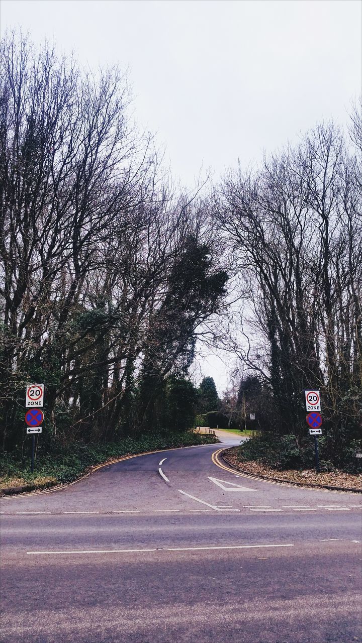 ROAD SIGN AGAINST SKY