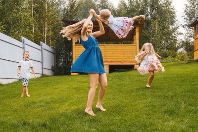 Rear view of women walking in park