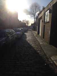 Sun shining through buildings