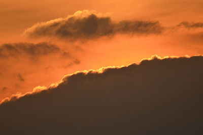 Low angle view of dramatic sky during sunset