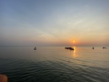 Scenic view of sea against sky during sunset