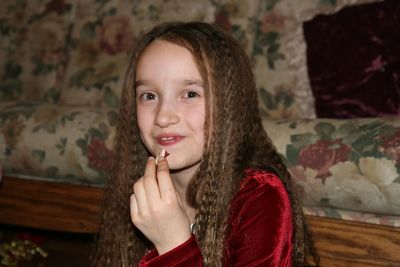 Portrait of smiling girl at home