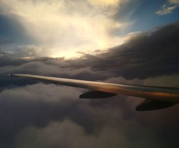 Low angle view of airplane flying in sky