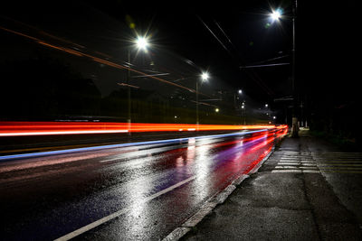 Lights of cars at night. street lights. night city. long-exposure photograph night road. colored
