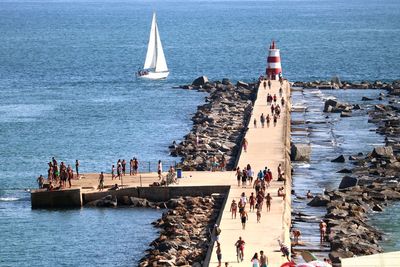 High angle view of people on boats in sea