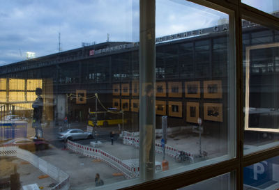 Reflection of building on glass window