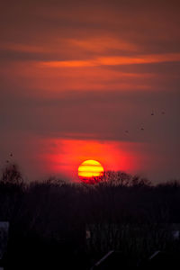 Scenic view of dramatic sky during sunset