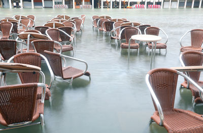 Empty chairs and tables in cafe