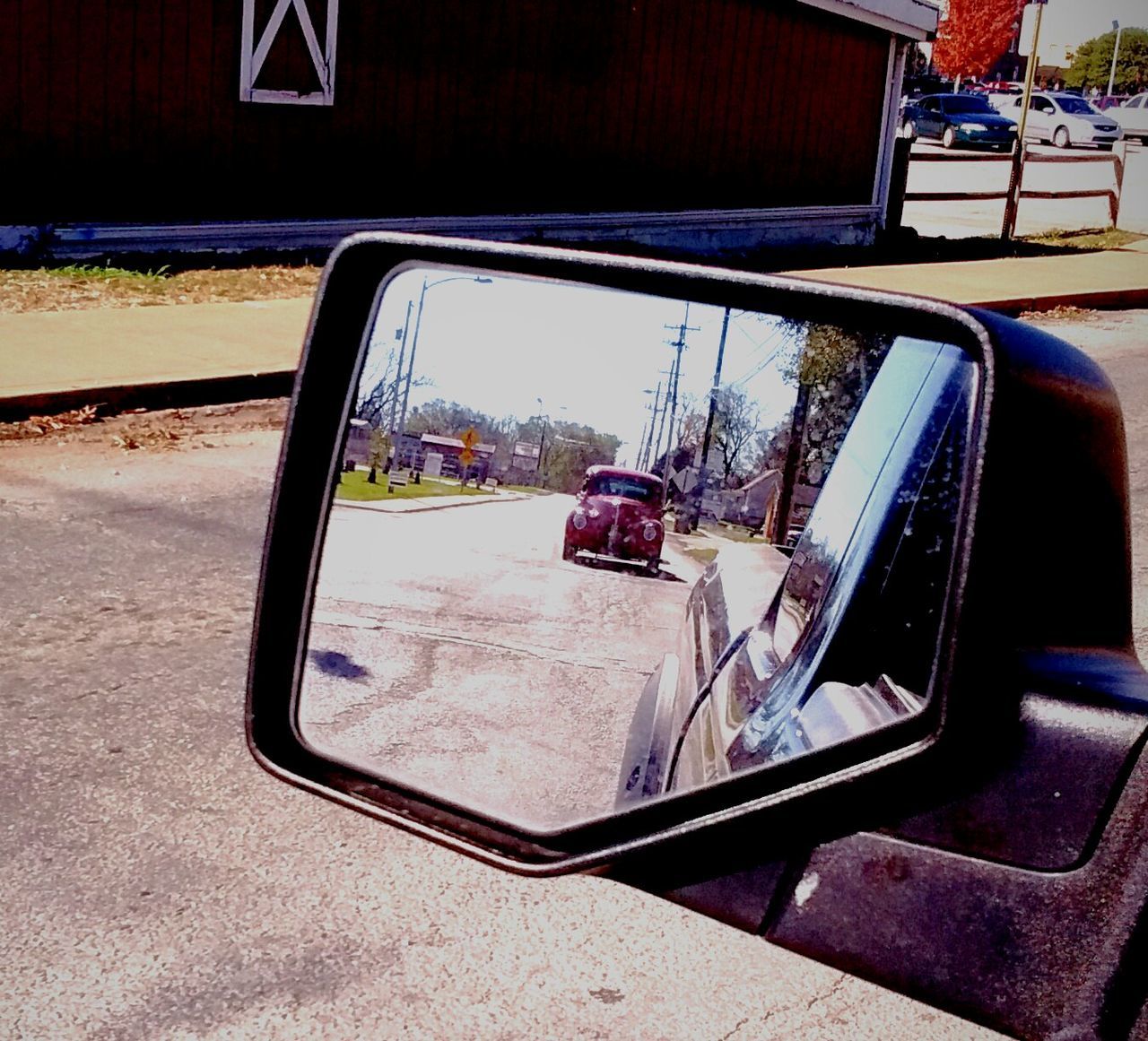 REFLECTION OF SKY ON CAR