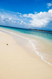 Scenic view of beach against sky