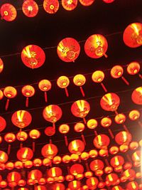 Multi colored lanterns hanging from ceiling