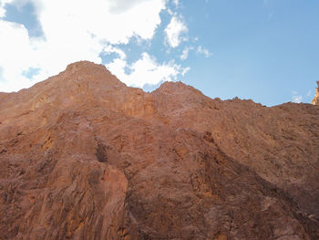 Scenic view of rocky mountains against sky