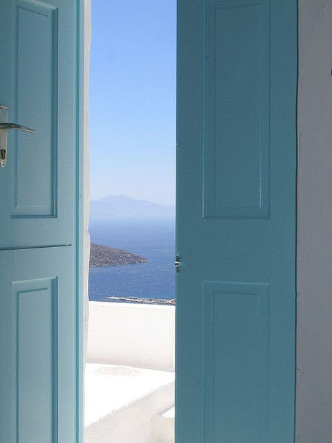 BLUE SEA SEEN THROUGH WINDOW