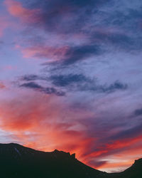 Low angle view of dramatic sky during sunset