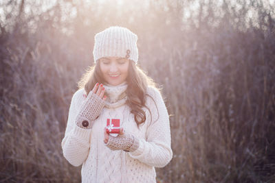 Portrait of young woman in snow