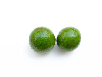 Close-up of fruits against white background