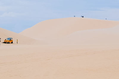 Scenic view of desert against sky