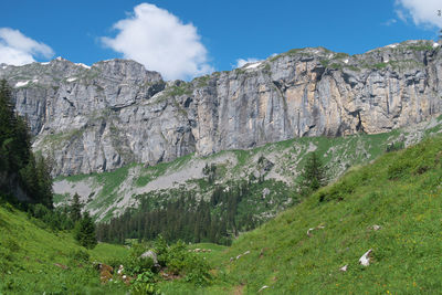 Scenic view of rocky mountains against sky