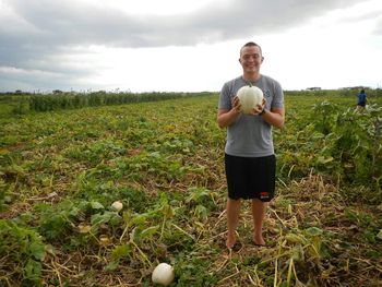 Man standing on grassy field