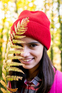 Close-up portrait of a smiling young woman