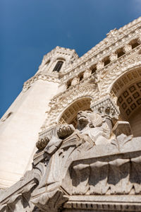 Low angle view of statue of historic building