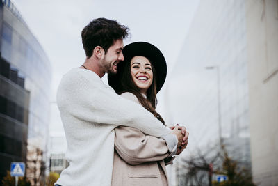 Young couple standing outdoors