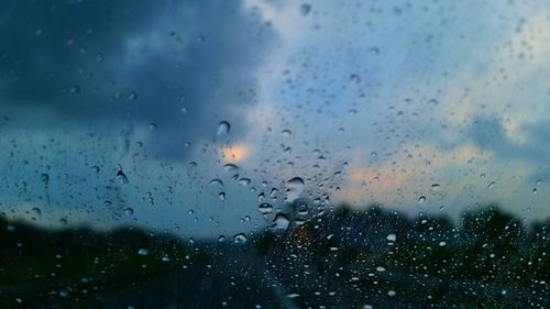 Close-up of water drops on glass window