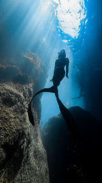 Woman freediving in sea