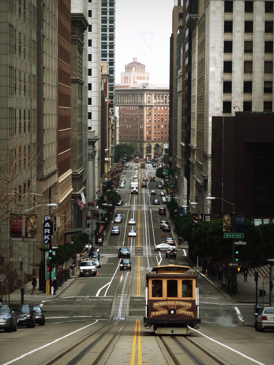 transportation, car, city, building exterior, land vehicle, mode of transport, architecture, built structure, street, road, traffic, city street, city life, road marking, the way forward, on the move, diminishing perspective, high angle view, vehicle, travel