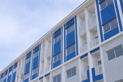 Low angle view of modern building against sky