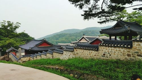 Houses with mountain range in background