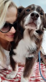 Portrait of woman with dog