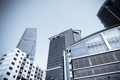 Low angle view of modern buildings against sky