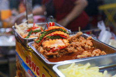 Sour and spicy boneless lemon chicken feet in ho thi ky street food, ho chi minh city