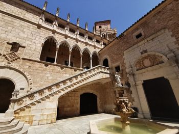 Low angle view of historical building against sky