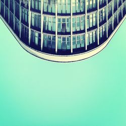 Low angle view of building against blue sky