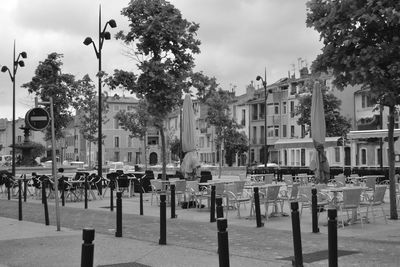 Panoramic view of street and buildings against sky