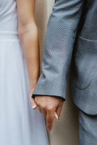 Unmarried hold hands